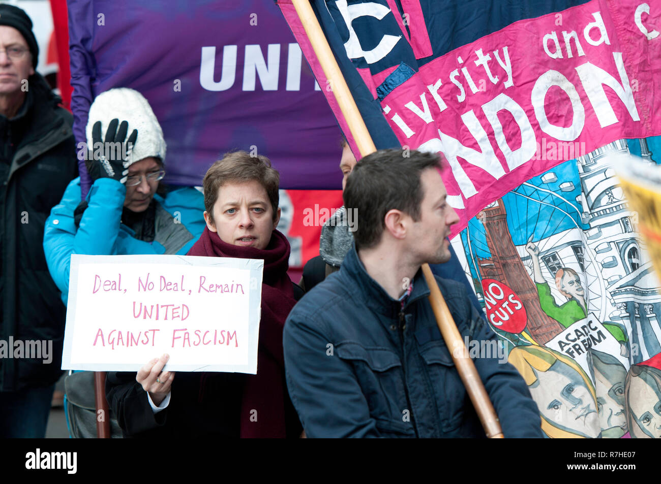 Protesters seen holding a signs during a demonstration against the 'Brexit Betrayal March'.   Thousands of people took to the streets in central London to march against the 'Brexit Betrayal March' organised by Tommy Robinson and UKIP. Counter Protesters made their way from Portland Place to Whitehall, where speakers addressed the crowd. During the counter demonstration, there was a strong police presence. A group of counter protesters, who became separated from the main protest, were corralled by police to avoid an encounter with a group of Tommy Robinson / UKIP supporters. Stock Photo