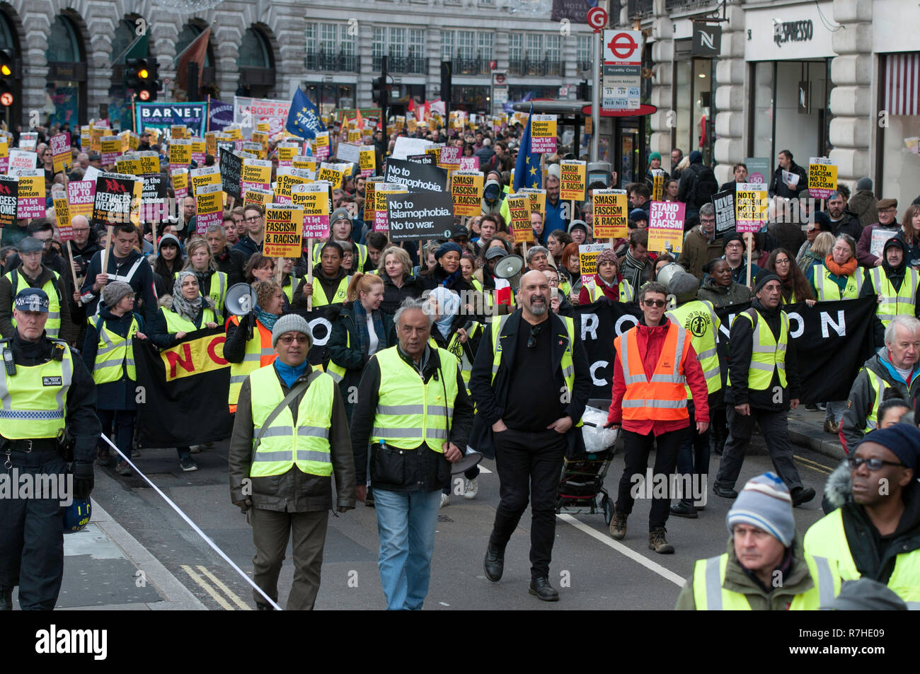 A general view of the counter protest against the 'Brexit Betrayal March'.   Thousands of people took to the streets in central London to march against the 'Brexit Betrayal March' organised by Tommy Robinson and UKIP. Counter Protesters made their way from Portland Place to Whitehall, where speakers addressed the crowd. During the counter demonstration, there was a strong police presence. A group of counter protesters, who became separated from the main protest, were corralled by police to avoid an encounter with a group of Tommy Robinson / UKIP supporters. Stock Photo