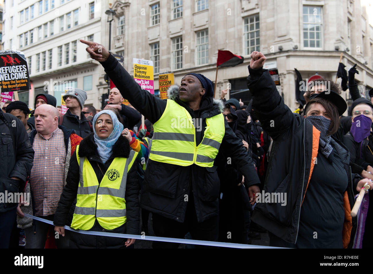 Protesters seen shouting slogans against to a few Tommy Robinson supporters that were close to the march during a demonstration against the 'Brexit Betrayal March'.  Thousands of people took to the streets in central London to march against the 'Brexit Betrayal March' organised by Tommy Robinson and UKIP. Counter Protesters made their way from Portland Place to Whitehall, where speakers addressed the crowd. During the counter demonstration, there was a strong police presence. A group of counter protesters, who became separated from the main protest, were corralled by police to avoid an encount Stock Photo