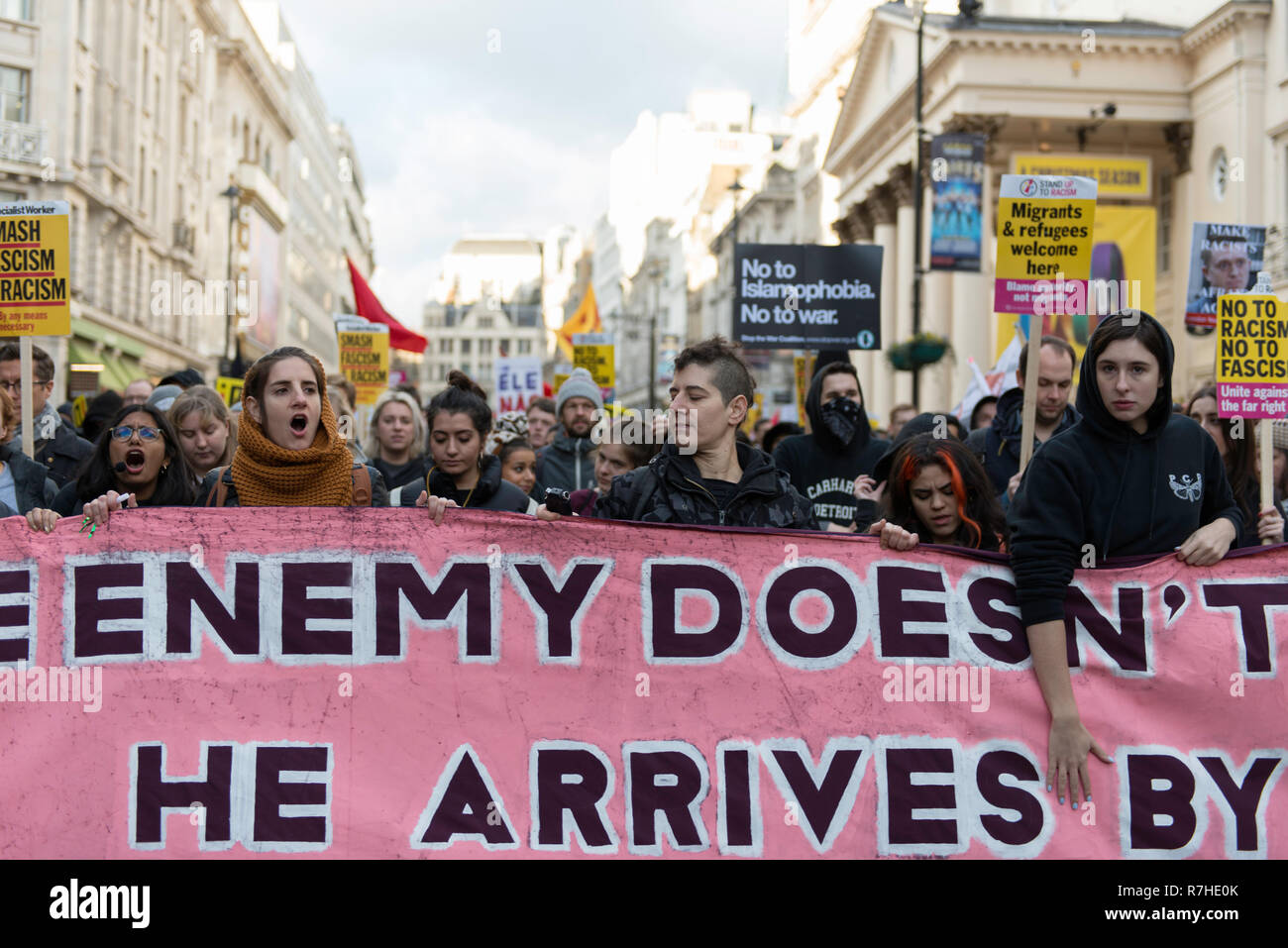 Counter protesters seen holding a large banner during a demonstration against the 'Brexit Betrayal March'.  Thousands of people took to the streets in central London to march against the 'Brexit Betrayal March' organised by Tommy Robinson and UKIP. Counter Protesters made their way from Portland Place to Whitehall, where speakers addressed the crowd. During the counter demonstration, there was a strong police presence. A group of counter protesters, who became separated from the main protest, were corralled by police to avoid an encounter with a group of Tommy Robinson / UKIP supporters. Stock Photo