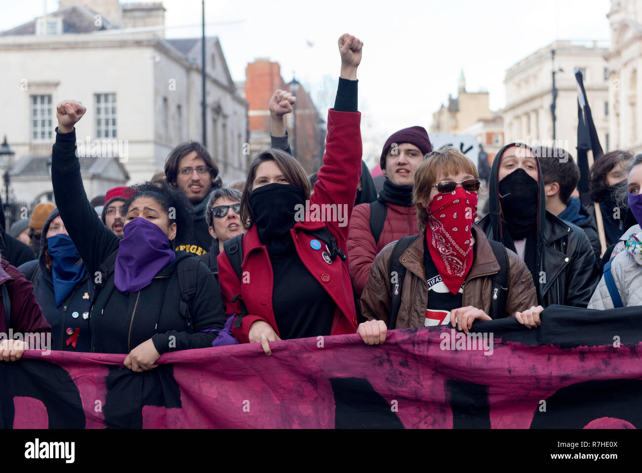 Counter protesters seen holding a banner while shouting slogans against the 'Brexit Betrayal March'.  Thousands of people took to the streets in central London to march against the 'Brexit Betrayal March' organised by Tommy Robinson and UKIP. Counter Protesters made their way from Portland Place to Whitehall, where speakers addressed the crowd. During the counter demonstration, there was a strong police presence. A group of counter protesters, who became separated from the main protest, were corralled by police to avoid an encounter with a group of Tommy Robinson / UKIP supporters. Stock Photo