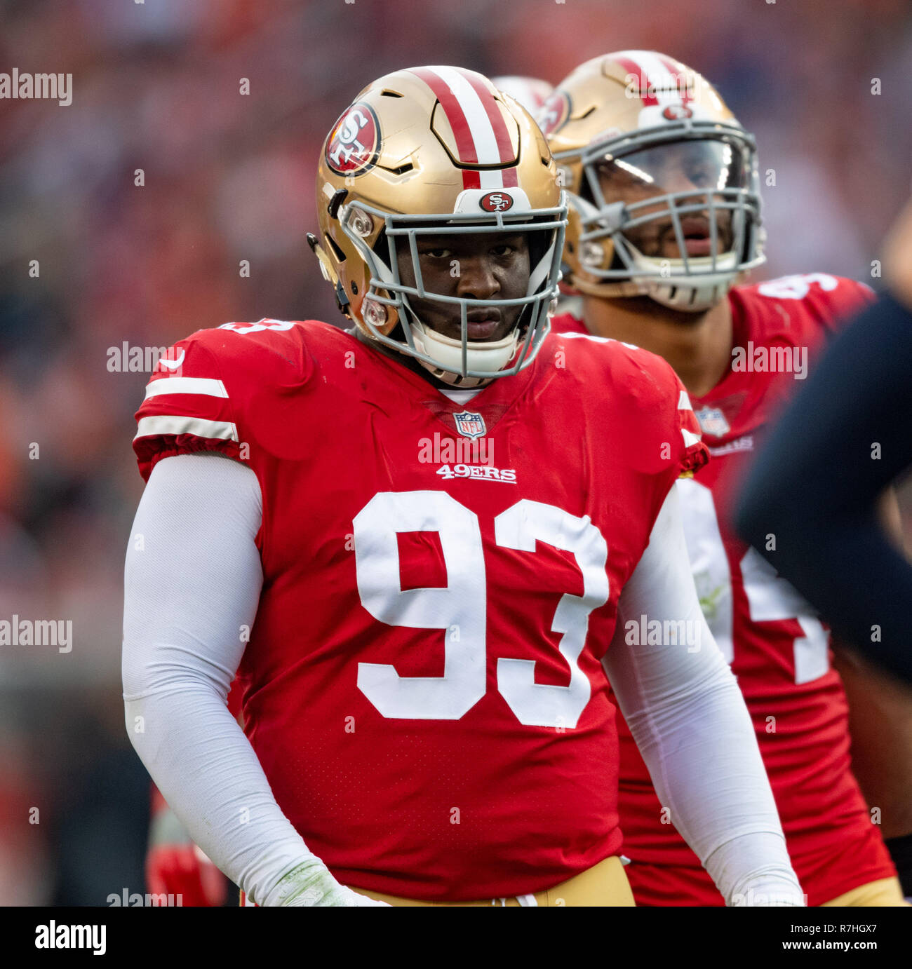 Santa Clara, California, USA. 23rd Dec, 2018. Chicago Bears quarterback  Mitchell Trubisky (10) get away from San Francisco 49ers defensive tackle  D.J. Jones (93) on Sunday, December 23, 2018, at Levis Stadium