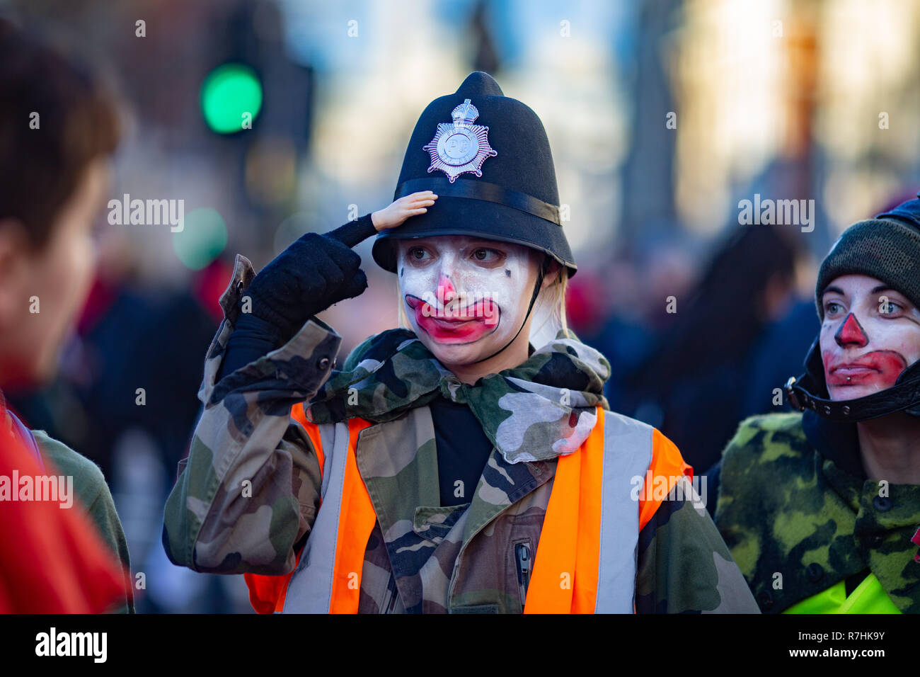 An Anti-Facist demonstrator dressed as a clown/policewoman.  3,000 Pro-Brexit demonstrators and 15,000 Anti-Facist counter demonstrators took to the streets of London to voice their stance on the deal ahead of the key Brexit vote in parliament this Tuesday. Stock Photo