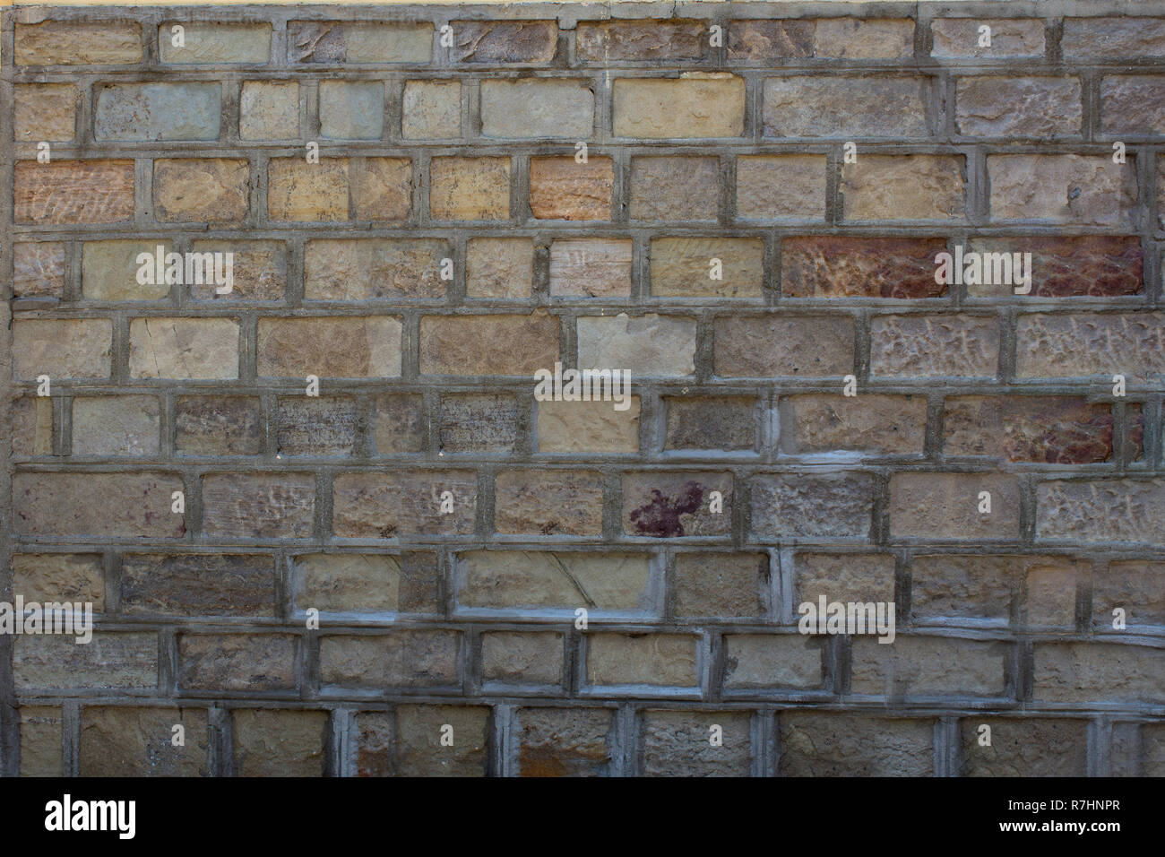Wall urban beige blocks. Stock Photo