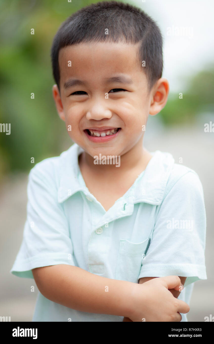 toothy smiling face of asian children happiness emotion Stock Photo - Alamy