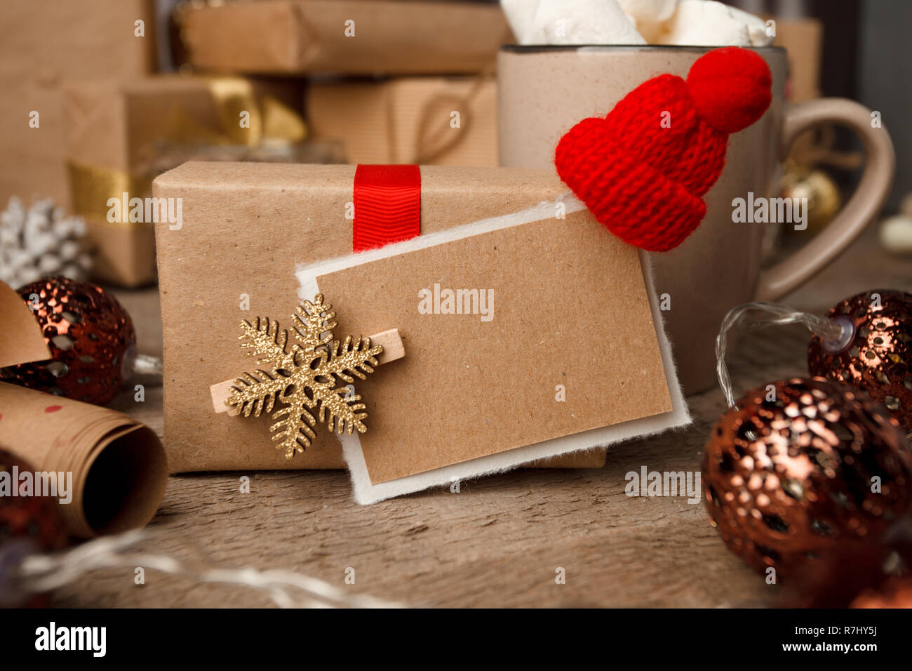 Christmas gifts with christmas decoration on vintage wooden background