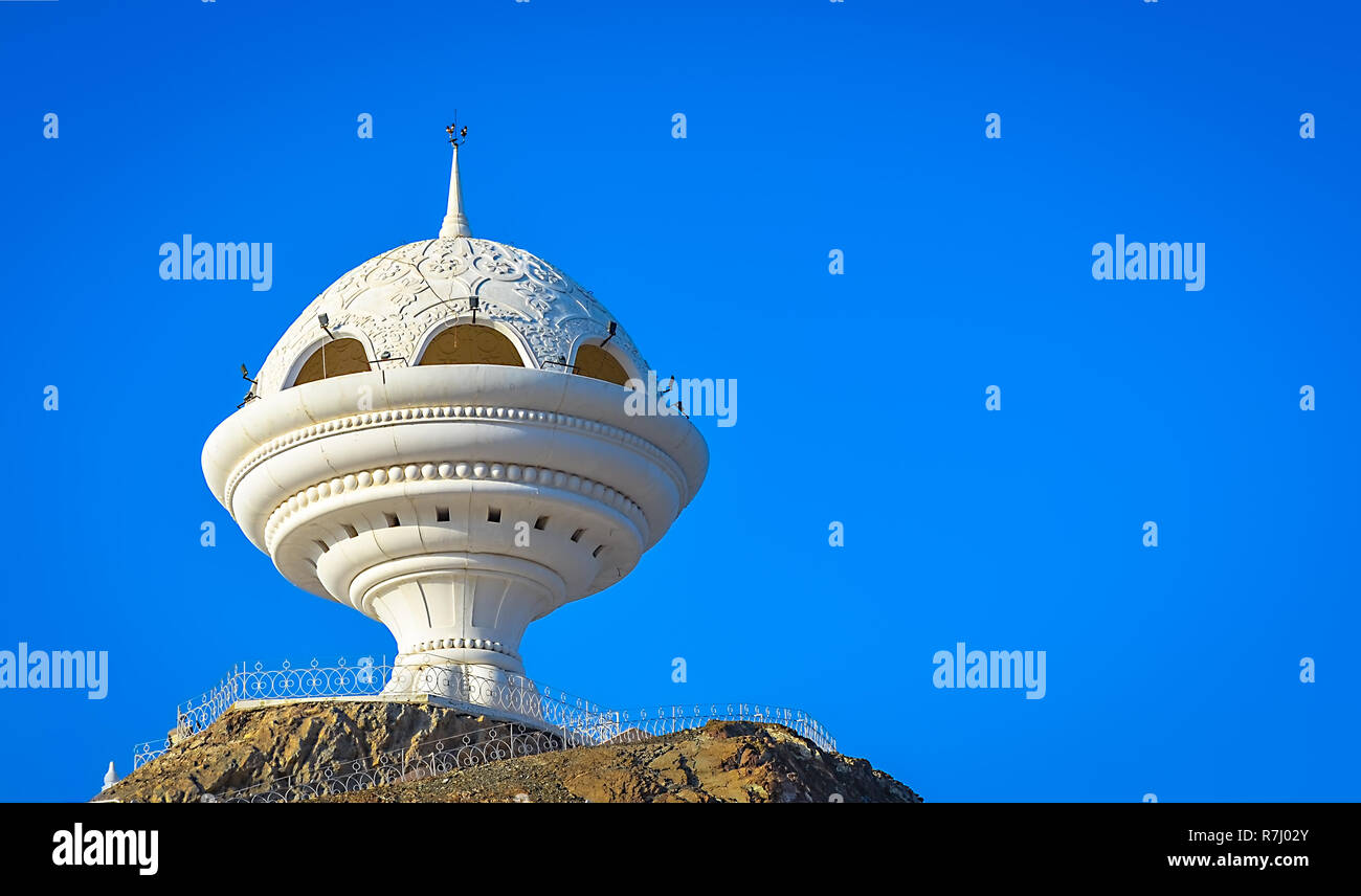 Giant frankincense burner monument in Riyam Park, Muscat, Oman with a clear blue sky as background. Stock Photo