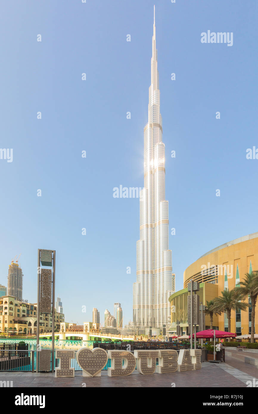 DUBAI, UAE - November 09, 2018: Burj Khalifa tower with I love Dubai text in front. This skyscraper is the tallest man-made structure in the world, me Stock Photo