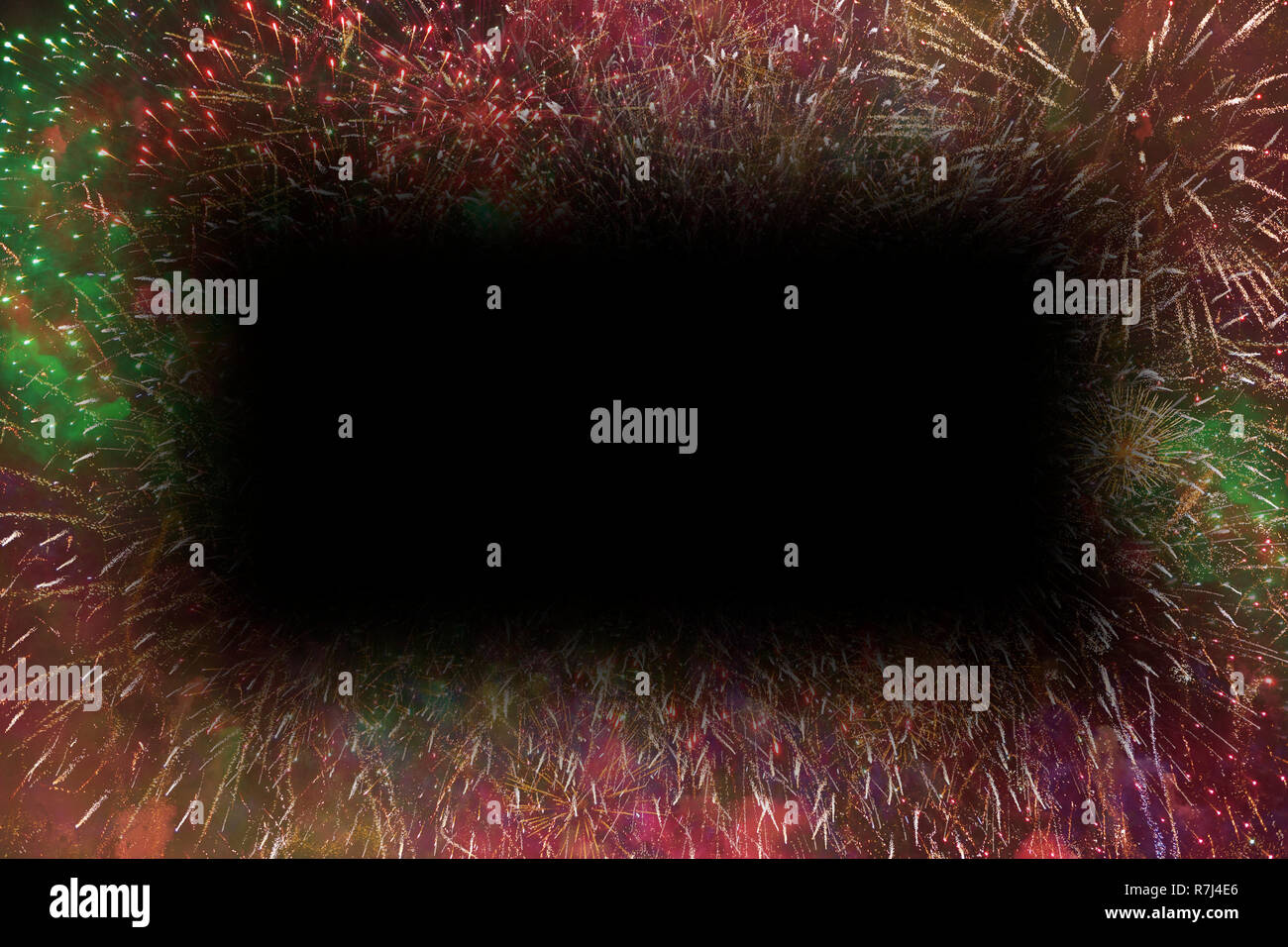 Colorful fireworks with black rectangle soft edges copy space in the middle Stock Photo