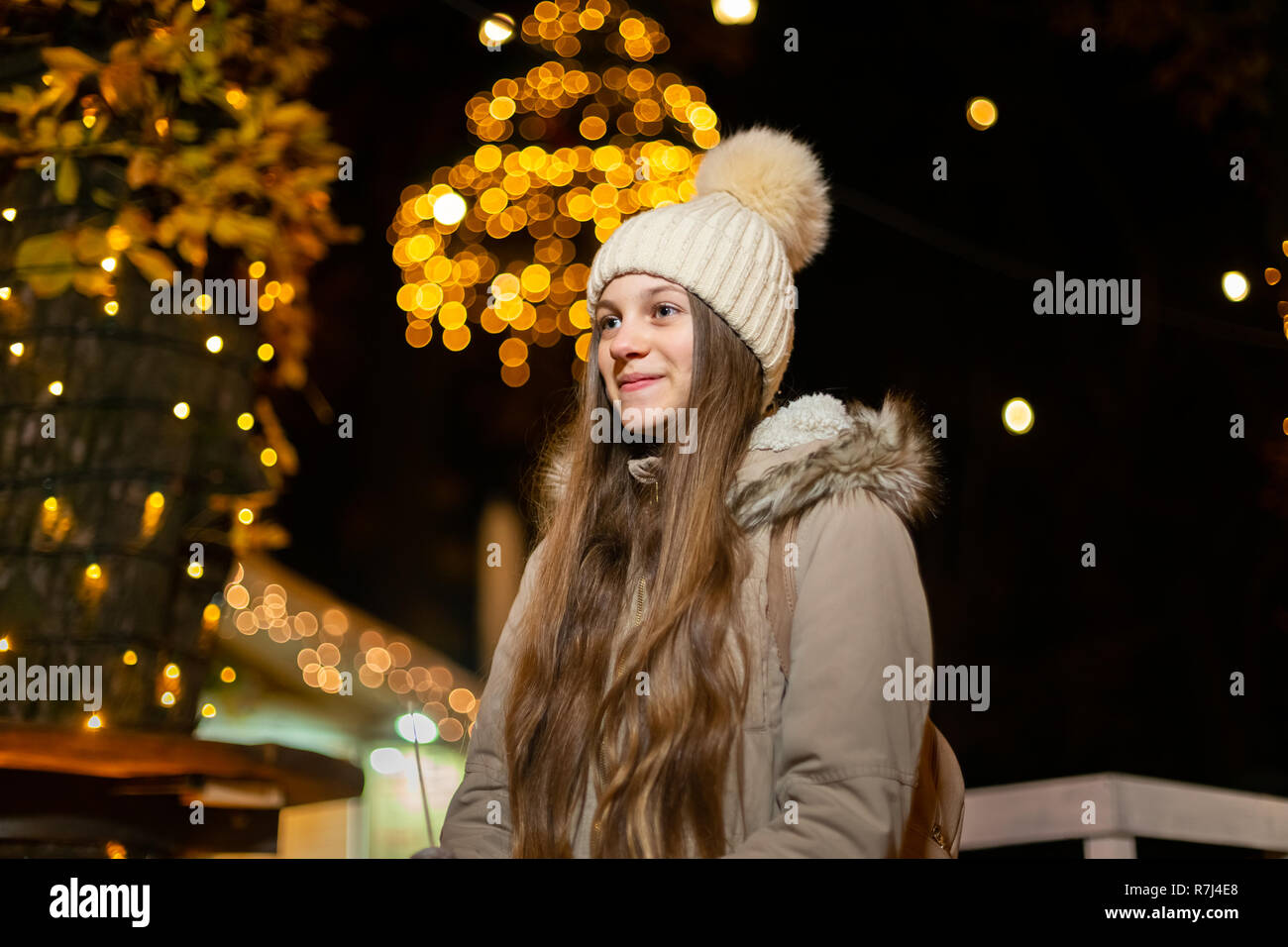 Portrait of teenager at traditional Christmas market. Zagreb, Croatia Stock Photo