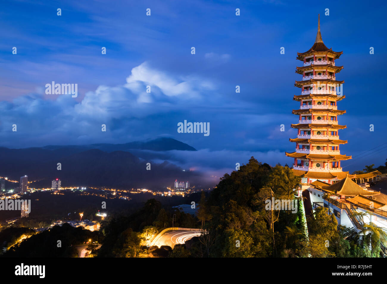 View of the Pagoda in the morning with low level cloud and hills in the background Stock Photo