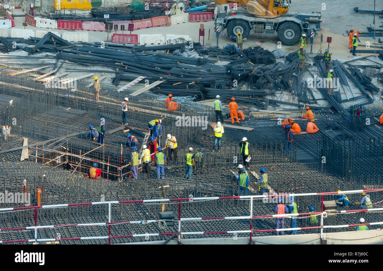 Workers at a construction site in UAE Stock Photo