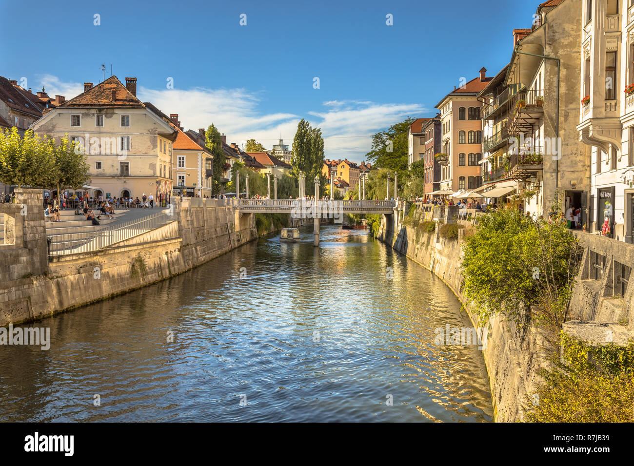 LJUBLJANA, SLOVENIA, AUGUST 11 2017: Cityscape view on Ljubljanica river canal in Ljubljana old town Stock Photo