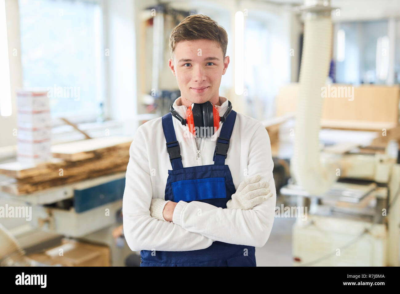 Content young carpenter in workshop Stock Photo