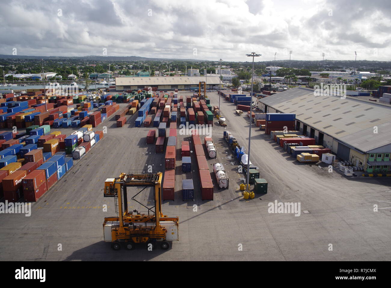 Shipping container handling, dockside, Barbados, Caribbean Stock Photo