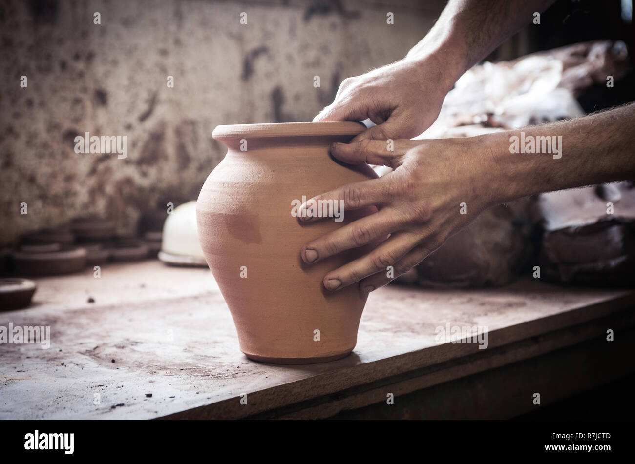 hands on pottery Stock Photo Alamy