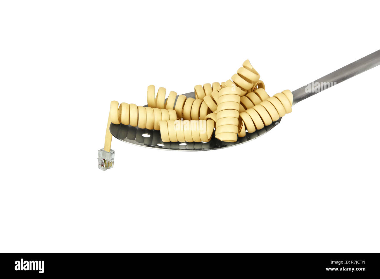 twisted the phone cord as pasta on a spoon Stock Photo
