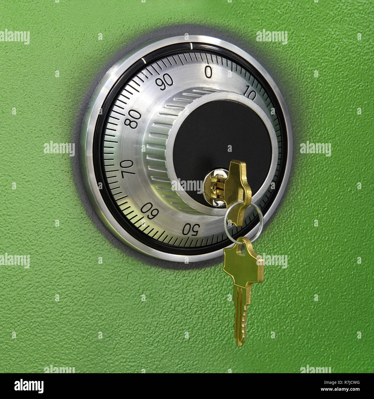 combination lock on the safe with two keys Stock Photo