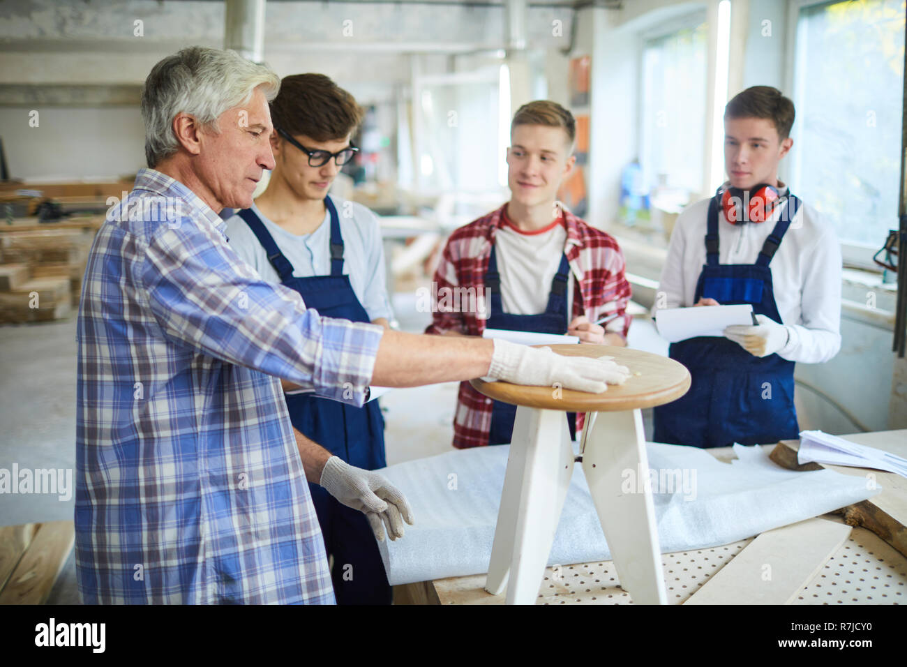 Teaching to make furniture from wood at class Stock Photo Alamy