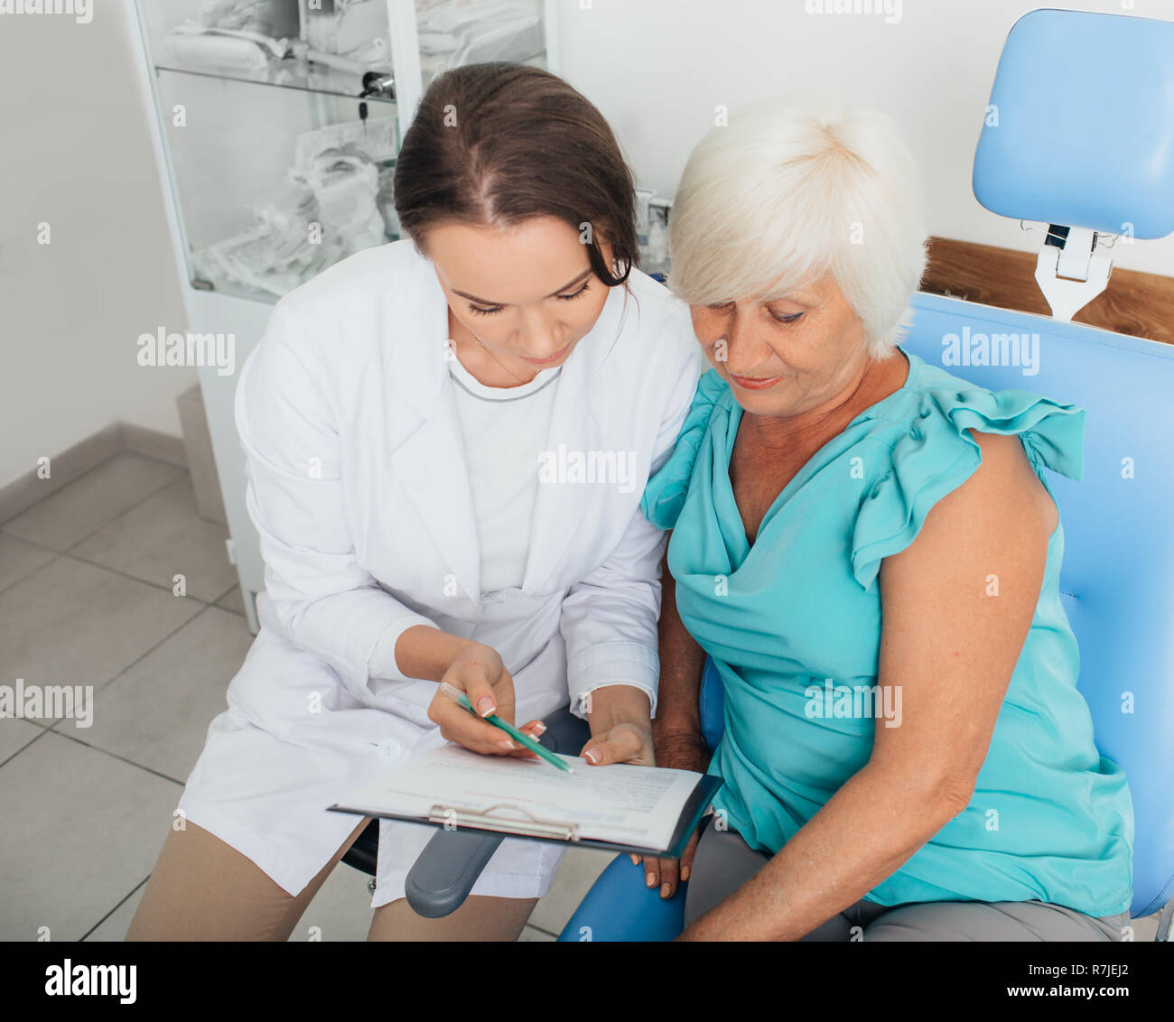 Senior doctor patient talking hi-res stock photography and images - Alamy