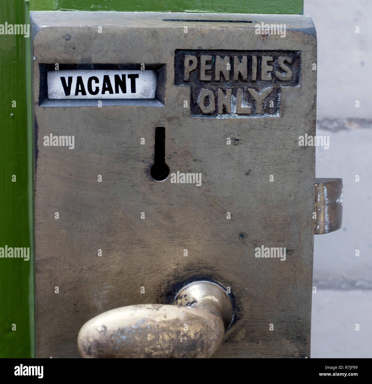 Antique brass public toilet door lock Stock Photo Alamy