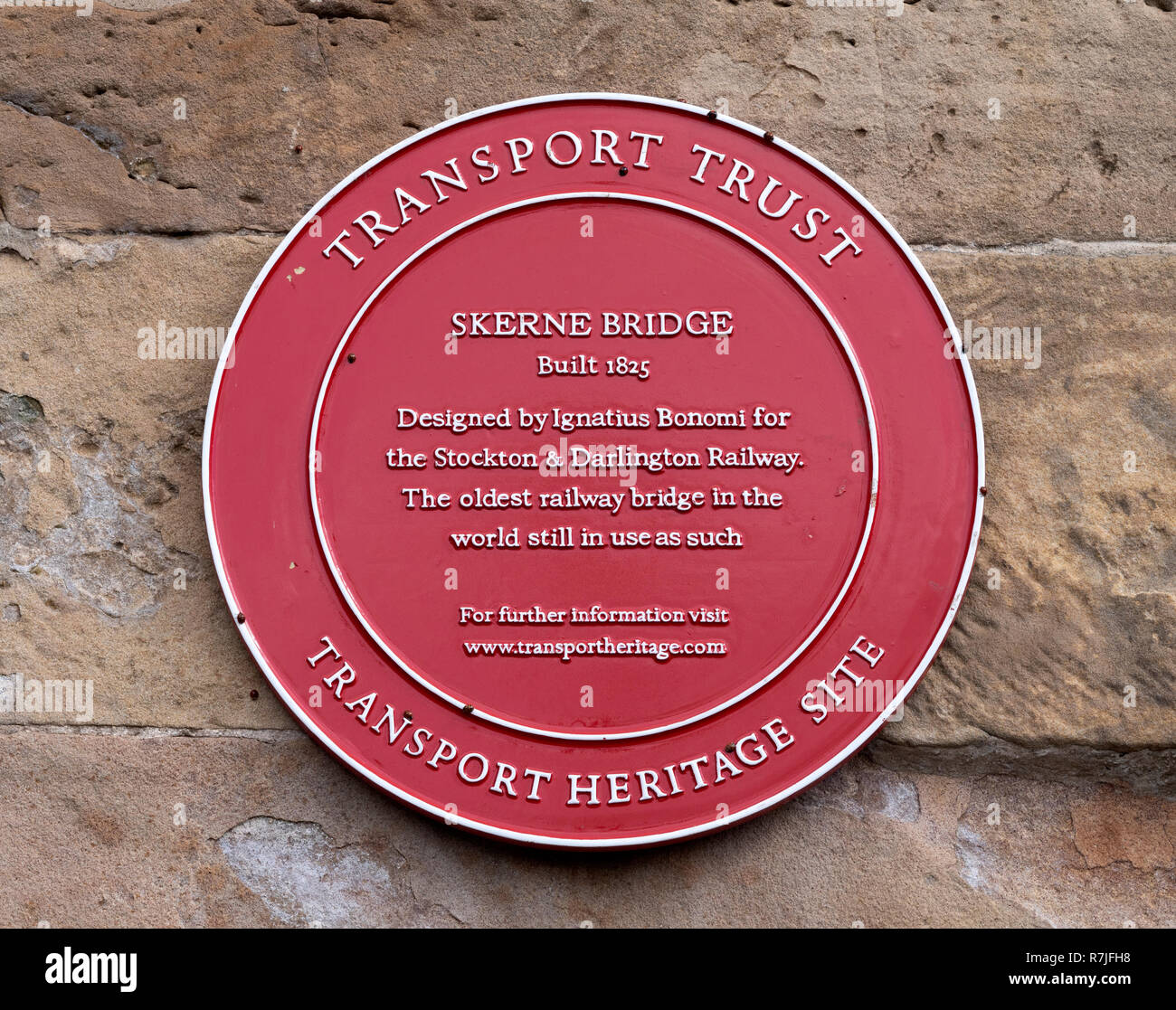 Transport Trust red heritage plaque at Skerne Bridge, Stockton & Darlington Railway, Darlington, County Durham, England, UK. Stock Photo
