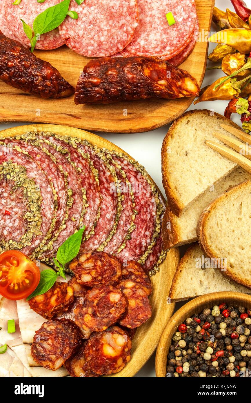 Italian dried salami crusted in ground black pepper. Bacon and sausage