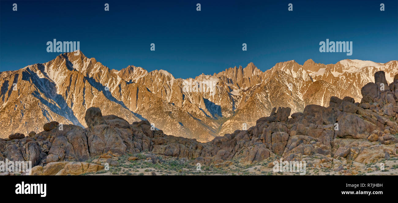 Eastern Sierra Nevada, Lone Pine Peak on left, Mount Whitney near center, view from Movie Road in Alabama Hills at sunrise, near Lone Pine, California Stock Photo