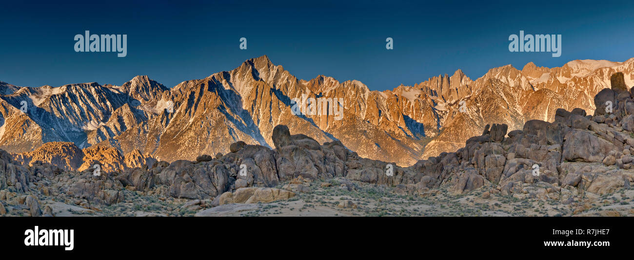 Eastern Sierra Nevada, Lone Pine Peak in center, Mount Whitney on right, view from Movie Road in Alabama Hills at sunrise, near Lone Pine, California, Stock Photo