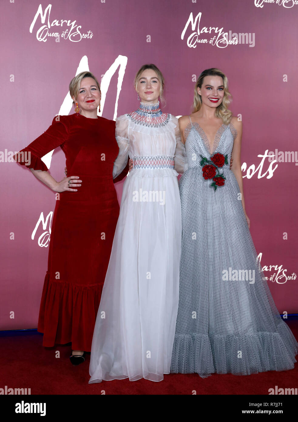 (left to right) Director Josie Rourke, Saoirse Ronan and Margot Robbie arrive at the European premiere of Mary Queen of Scots at Cineworld Leicester Square, London. Stock Photo
