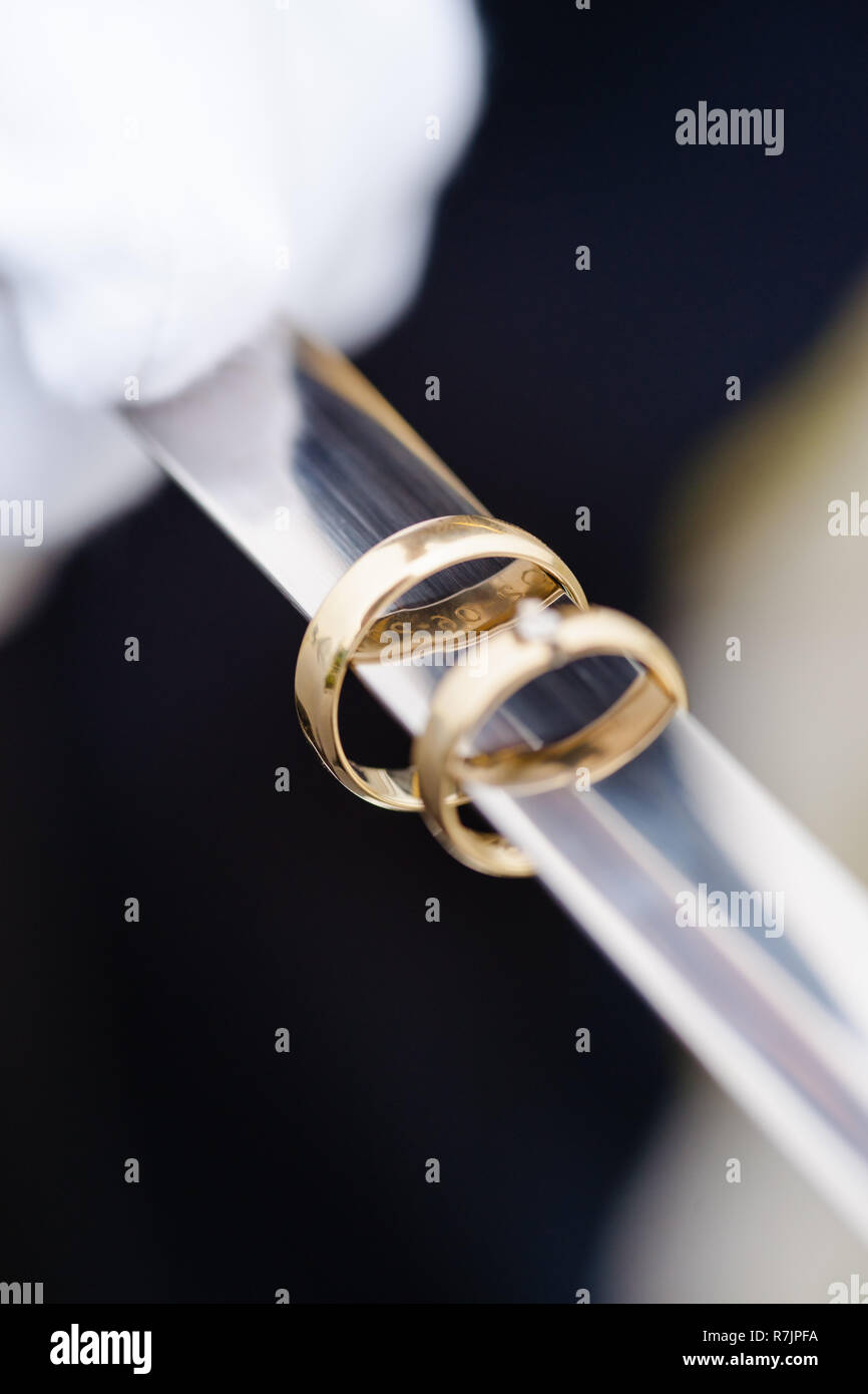 A newly weding couple showing off their wedding rings Stock Photo Alamy