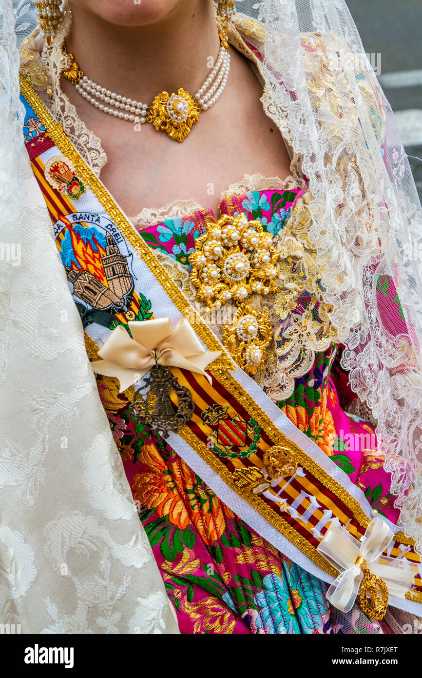 Fallas festival.Falleras parade offering flowers to the Virgin. Valencia. Valencian Community. Spain. Intangible Cultural Heritage of Humanity. UNESCO Stock Photo