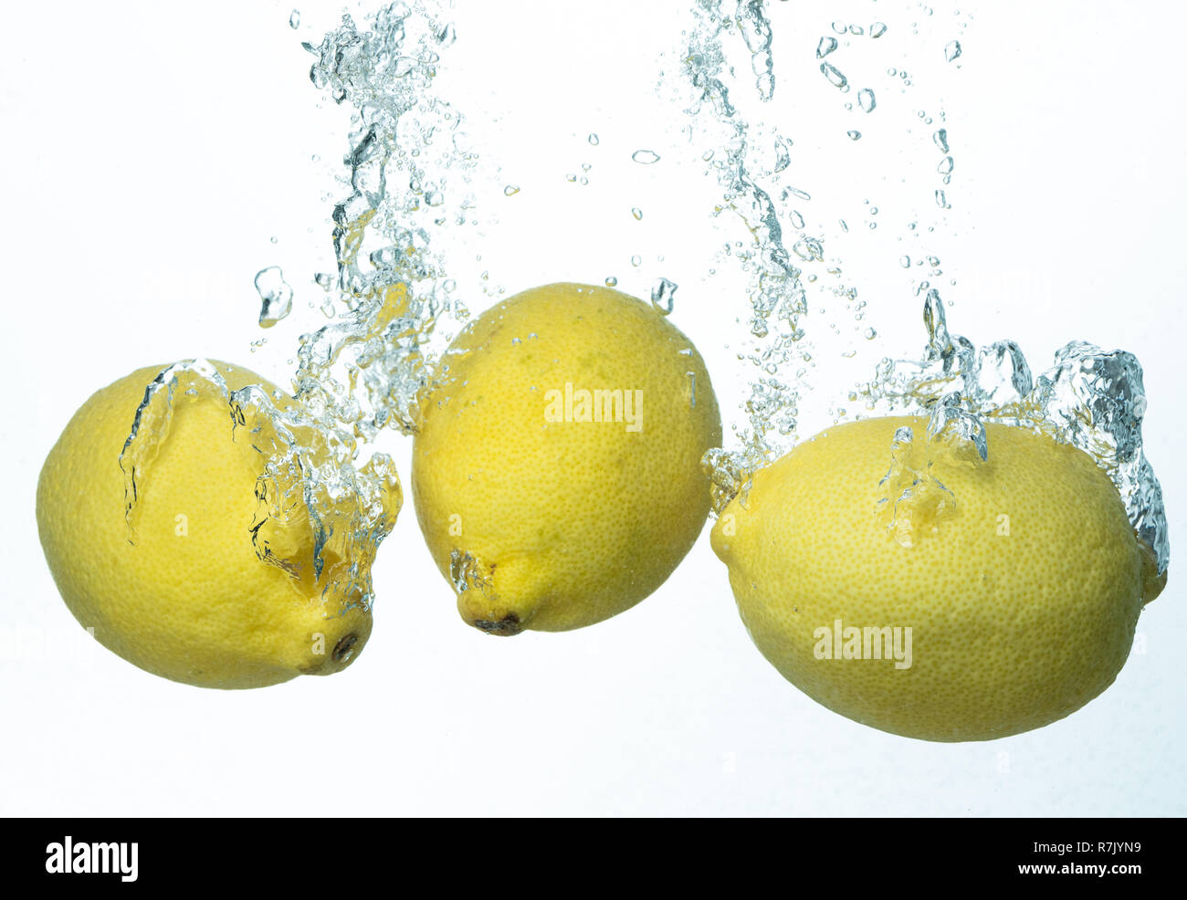 Lemons Water Splash on white background Stock Photo