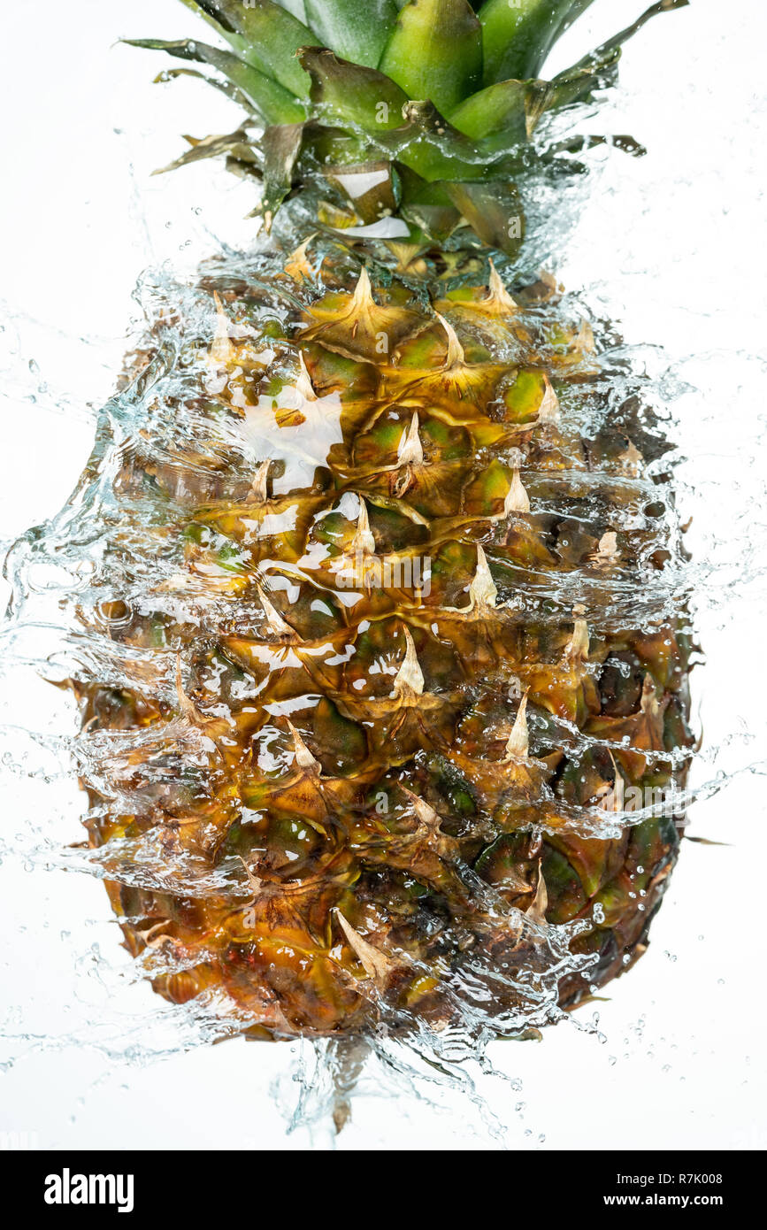 Pineapple Water Splash on White Baclground Stock Photo