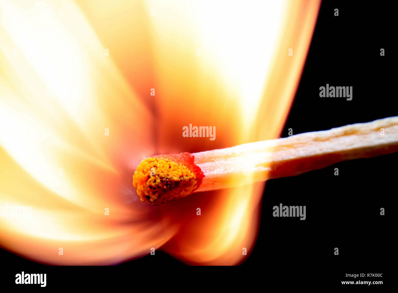 Matchstick fire burning, macro studio shot and empty space for text Stock Photo