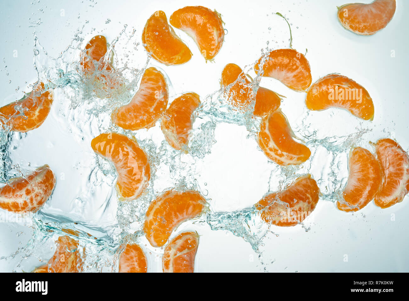 Oranges Water Splash on white background Stock Photo Alamy