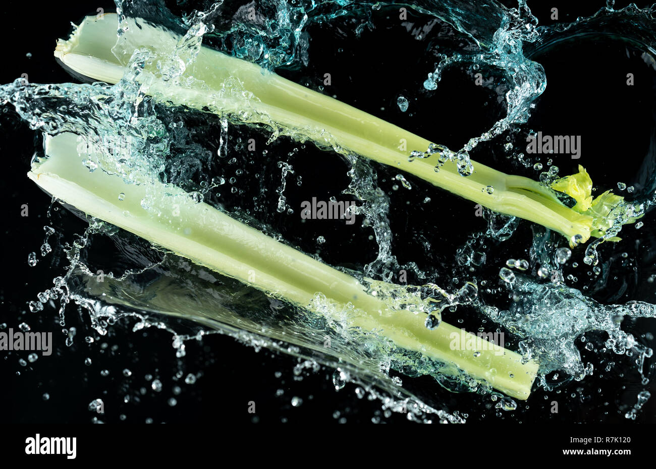 Celery Water Splash on black background Stock Photo Alamy