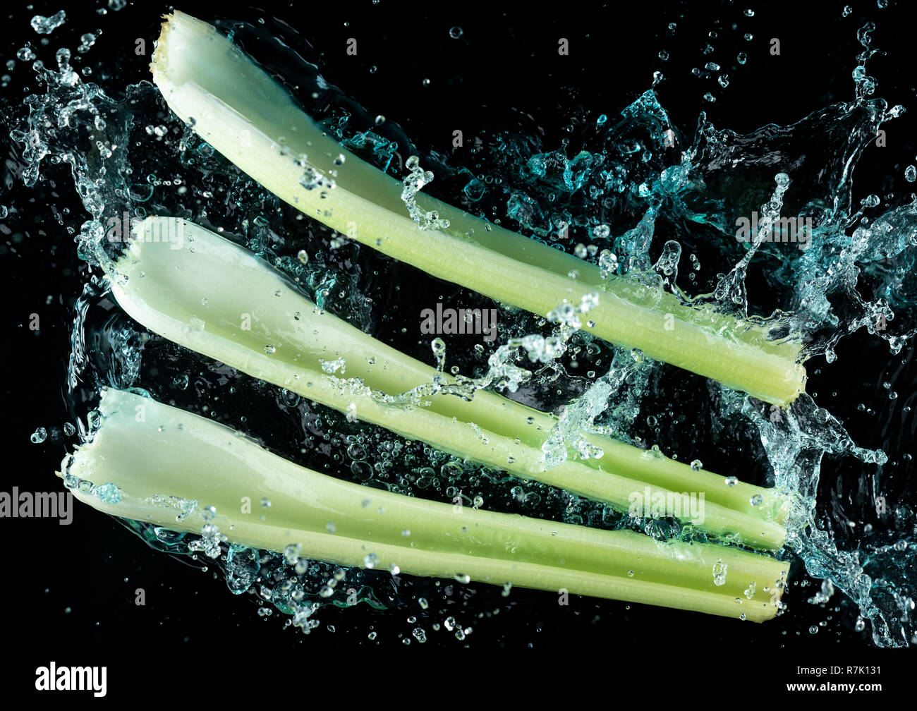 Celery Water Splash on black background Stock Photo Alamy