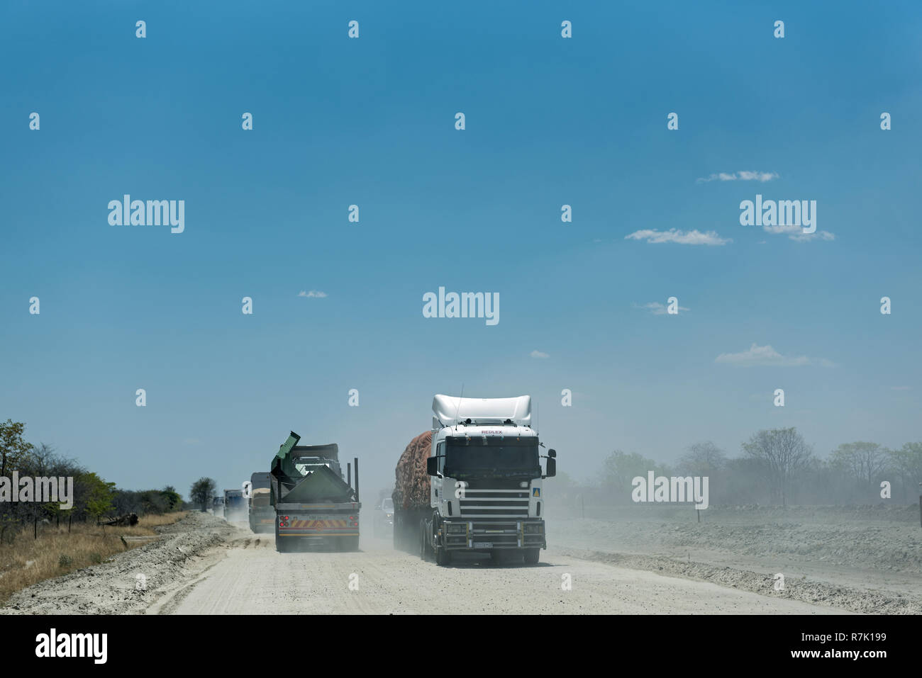 Truck on a dirt gravel road in Botswana Stock Photo