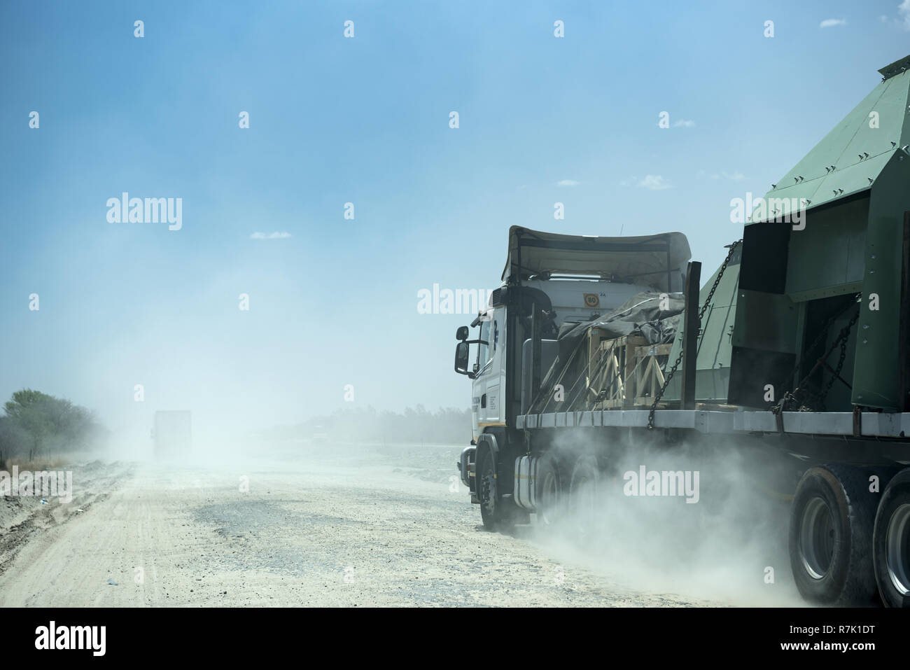 Truck on a dirt gravel road in Botswana Stock Photo
