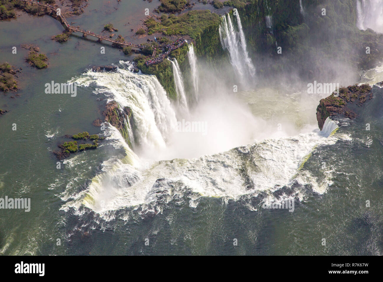 Aerial view of beautiful Iguazu Falls Devil's Throat chasm from a helicopter flight. Brazil and Argentina. South America. Latin America. Stock Photo