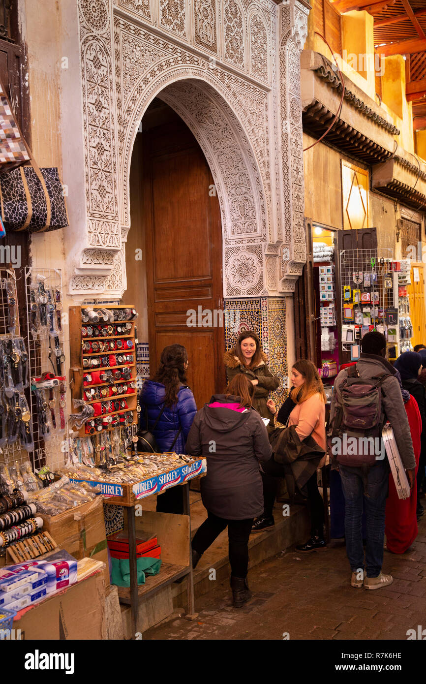 Morocco, Fes, Fes el Bali, Medina, Talaa Seghira, Medersa Bou Inania, tourists at entrance Stock Photo
