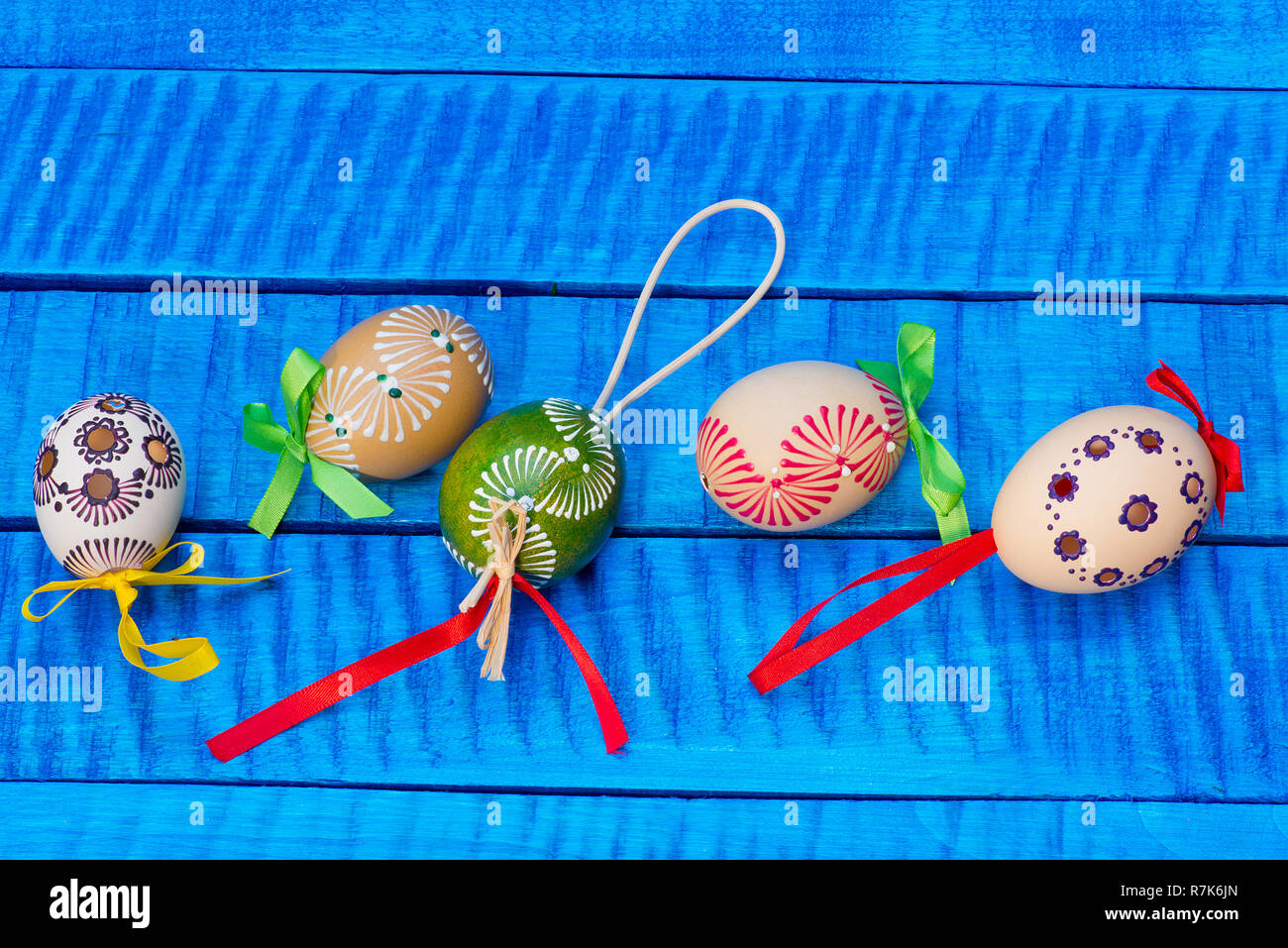 Painted Easter eggs on the blue table Stock Photo
