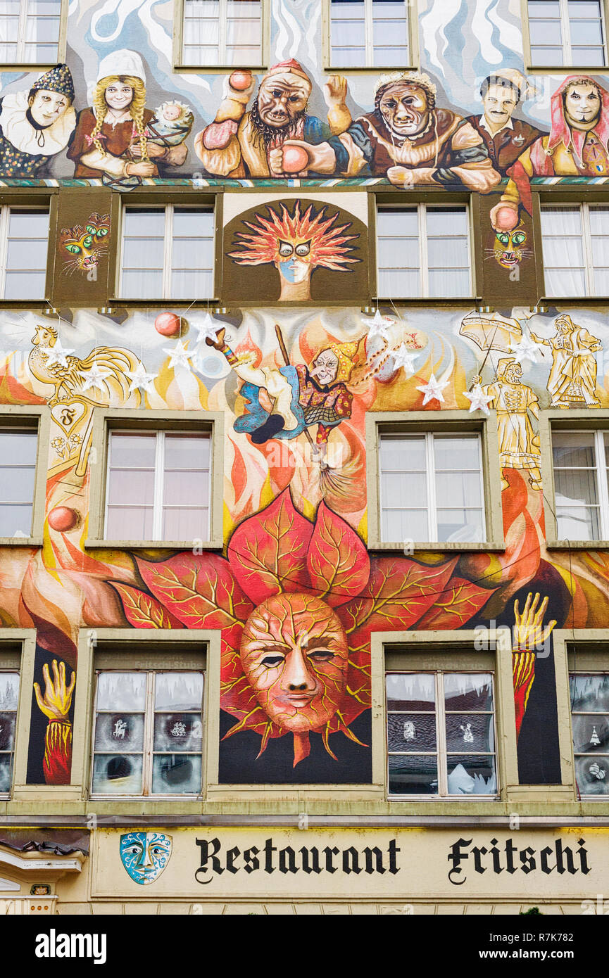 Colorful facade of Restaurant Fritschi in old town on Sternenplatz in