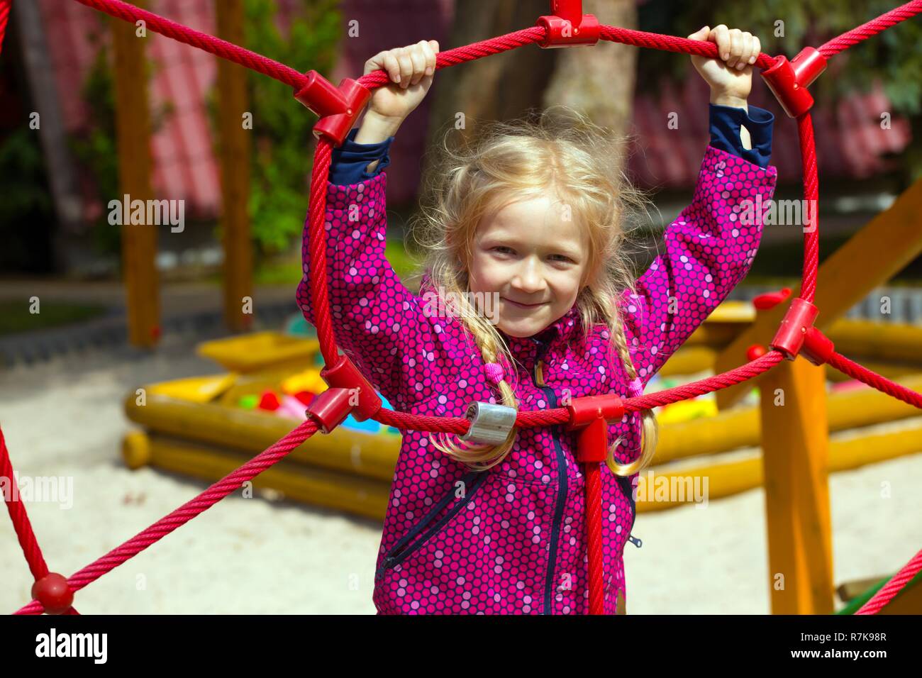 smiling little girl at the playground Stock Photo - Alamy