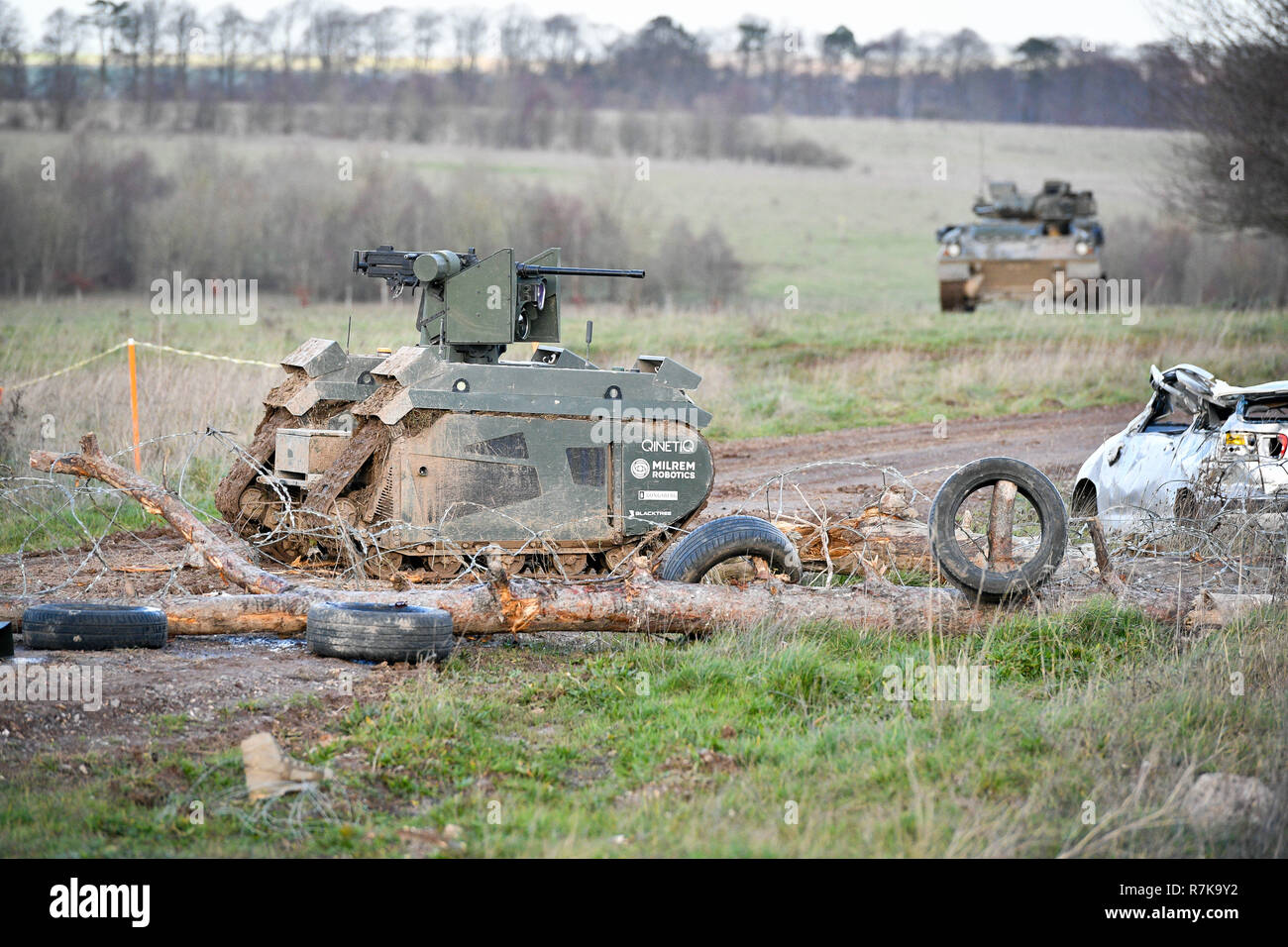 STANDALONE PHOTO A Titan Strike unmanned ground vehicle, equipped with a .50 Caliber machine gun, moves and secures ground on Salisbury Plain during exercise Autonomous Warrior 18, where military personnel, government departments and industry partners are taking part in Exercise Autonomous Warrior, working with NATO allies in a groundbreaking exercise to understand how the military can exploit technology in robotic and autonomous situations. Stock Photo