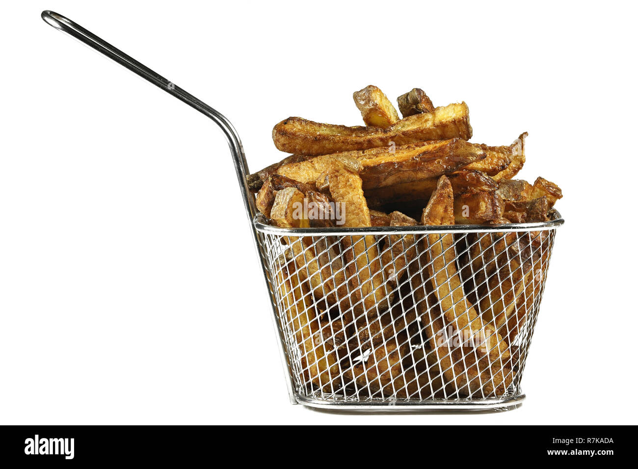 homemade French fries in a small deep fryer basket isolated on wooden background Stock Photo Alamy