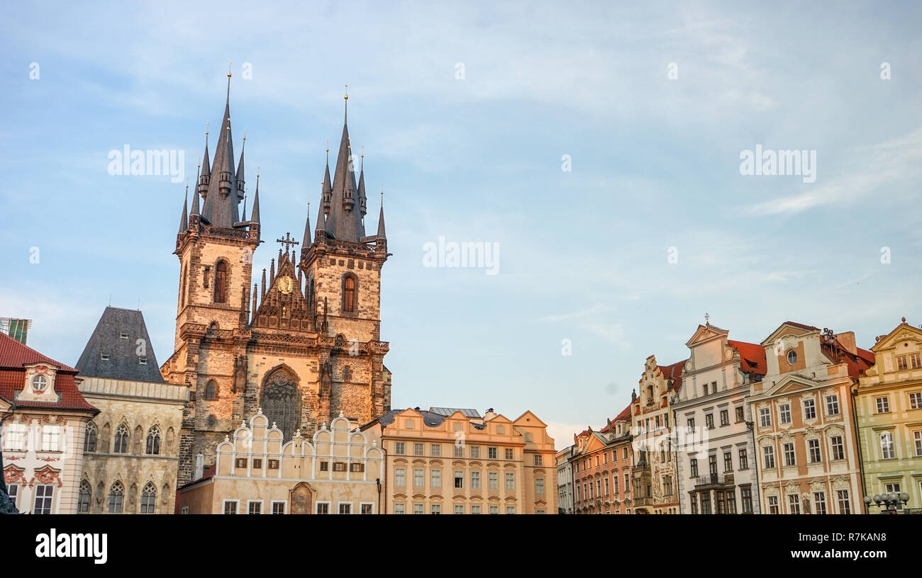 Old Town Square in Prague with magnificent town houses and church Stock Photo