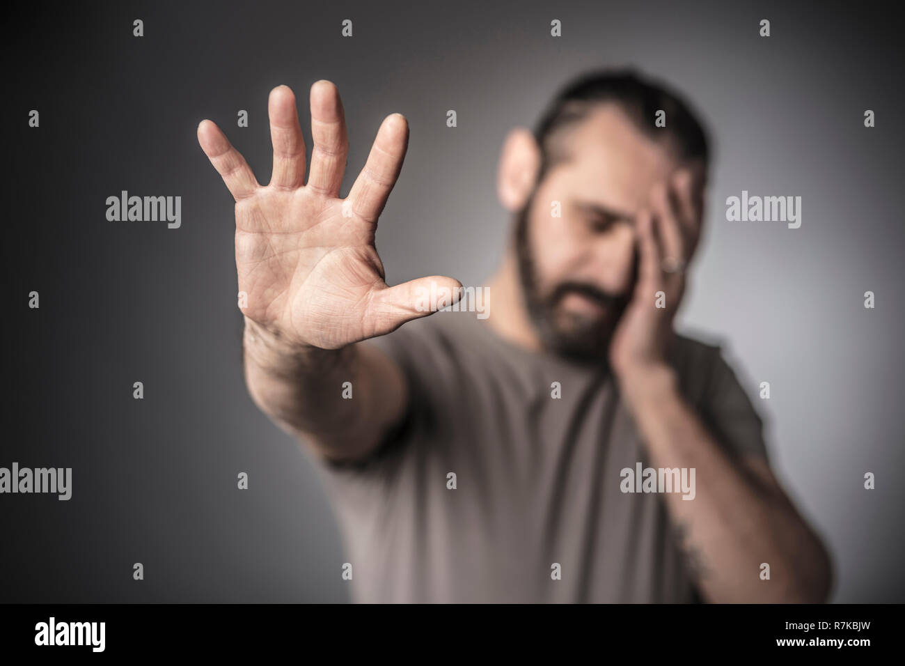 portrait of caucasian frustrated man selective focus Stock Photo