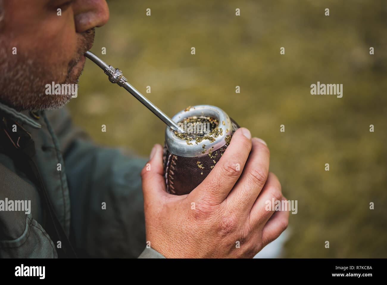 Middle aged man drinking yerba mate in nature. Travel and adventure  concept. Latin American drink yerba mate Stock Photo - Alamy